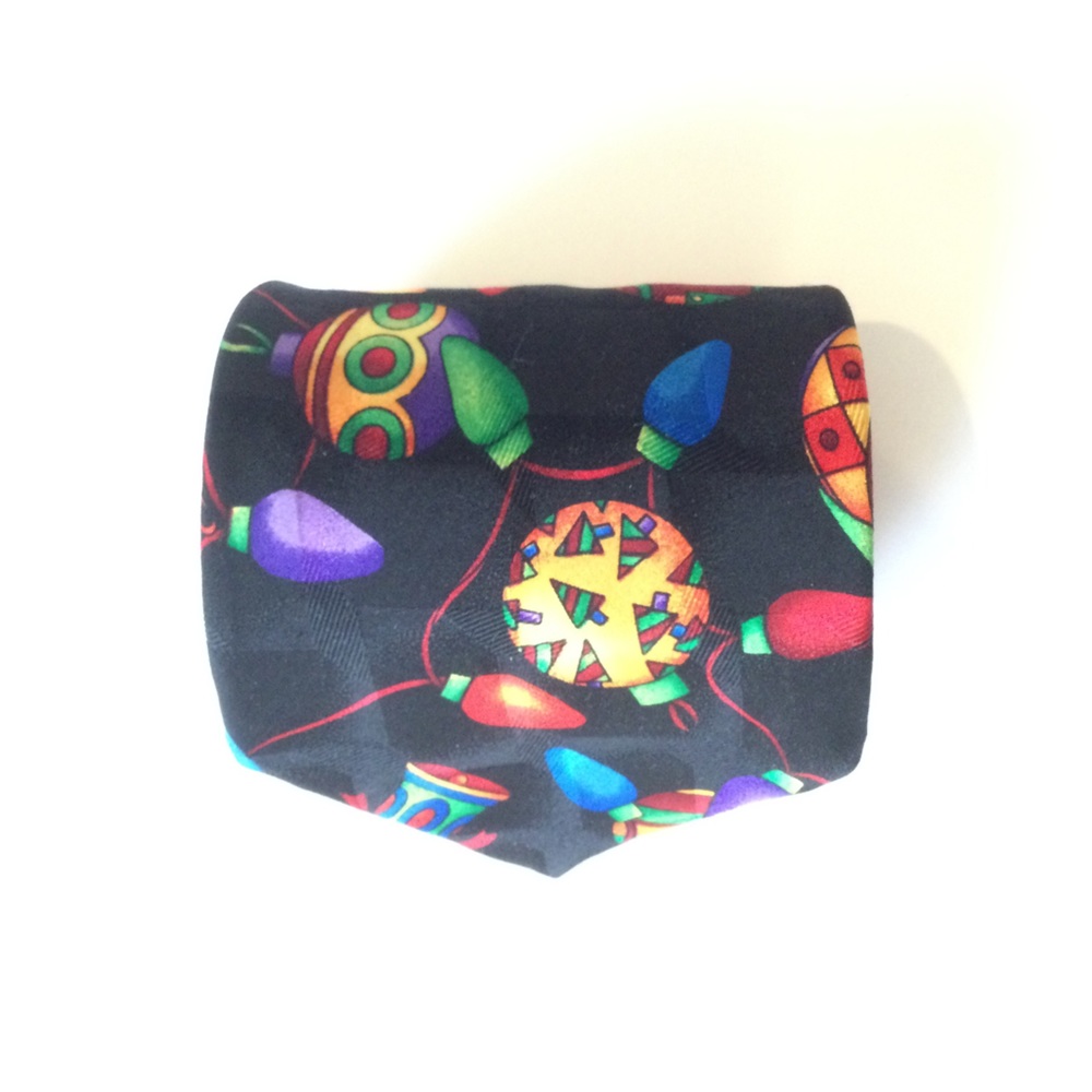 Addiction Necktie Christmas Ornaments and Lights Black background.